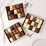 45-piece dessert gift box with assorted chocolate-covered brownie bites, cake bites, and rainbow cookie bites. Ready-to-share assortment for birthdays, parties, corporate gifts, holidays, and dessert tables.