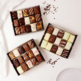 45-piece dessert gift box with assorted chocolate-covered brownie bites, cake bites, and rainbow cookie bites. Ready-to-share assortment for birthdays, parties, corporate gifts, holidays, and dessert tables.