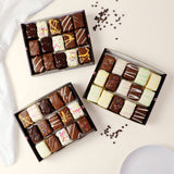 45-piece dessert gift box with assorted chocolate-covered brownie bites, cake bites, and rainbow cookie bites. Ready-to-share assortment for birthdays, parties, corporate gifts, holidays, and dessert tables.