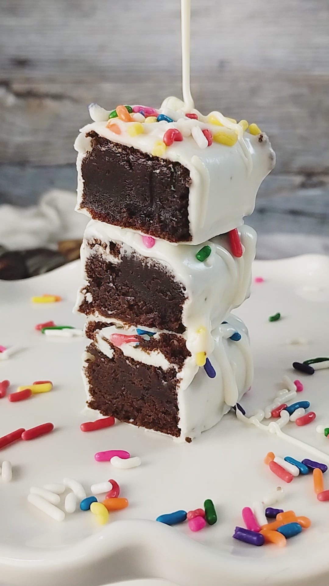 Rich, fudgy brownie bites hand-dipped in creamy white chocolate for a smooth, sweet finish. A handcrafted bite-sized treat that's perfect for gifting, celebrations, or enjoying one at a time.